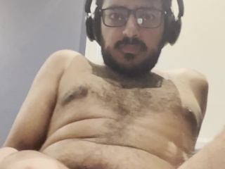 Stroking my dick while sitting on the floor