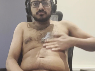Stroking my dick while putting cream on my body