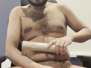 Stroking my dick while rubbing cardboard on myself